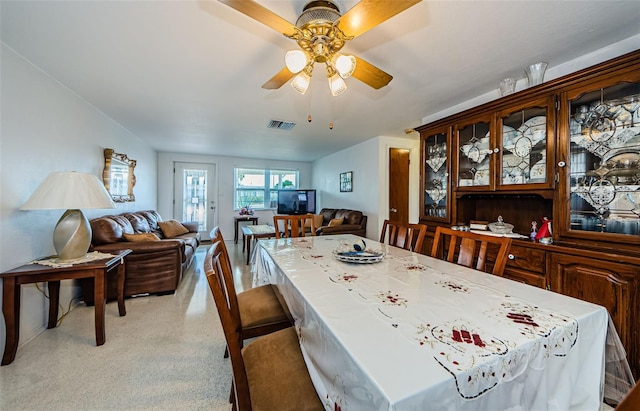 dining space featuring ceiling fan