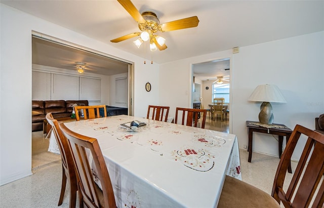 dining space featuring ceiling fan