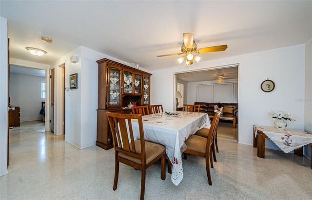 dining room with ceiling fan