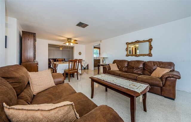 living room with ceiling fan