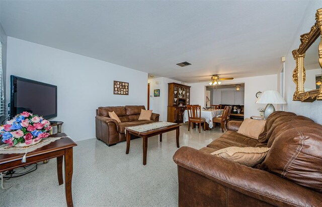 living room featuring ceiling fan