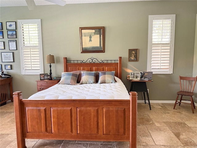 bedroom featuring ceiling fan