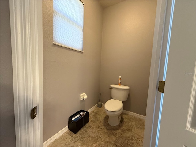 bathroom featuring toilet