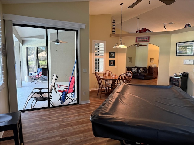 recreation room featuring hardwood / wood-style flooring, lofted ceiling, plenty of natural light, and pool table