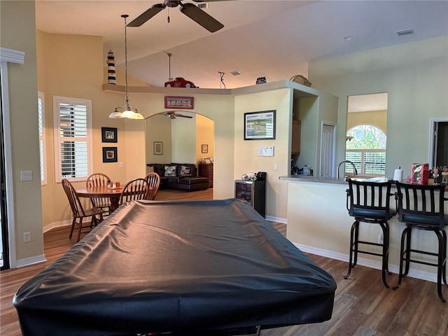 recreation room with hardwood / wood-style floors, ceiling fan, billiards, and high vaulted ceiling