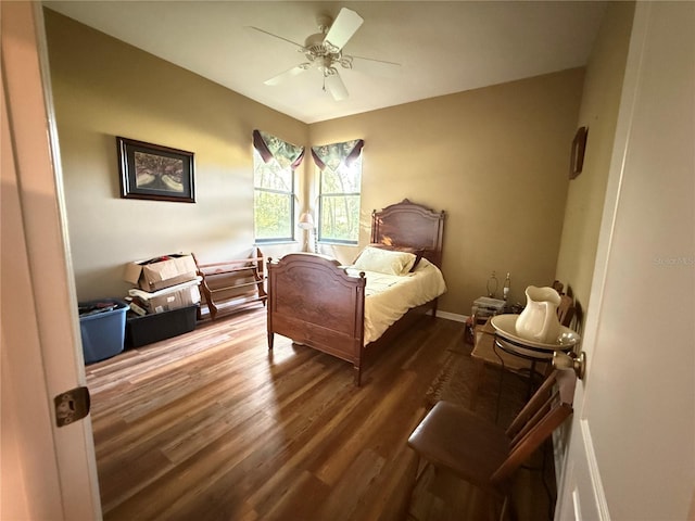 bedroom featuring ceiling fan and hardwood / wood-style floors