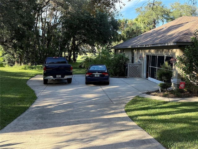 view of property exterior featuring a lawn