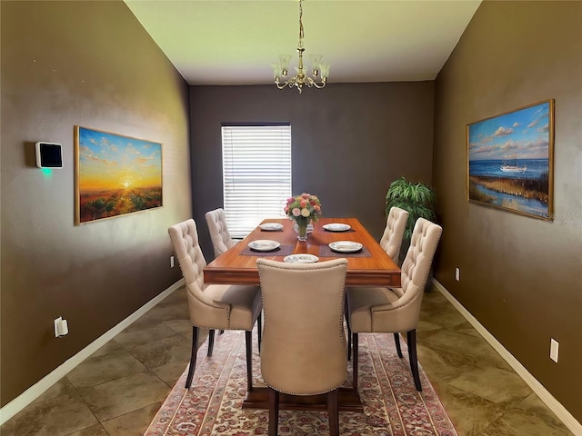 tiled dining area featuring a notable chandelier