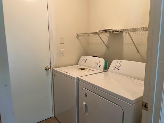 laundry area featuring washing machine and dryer