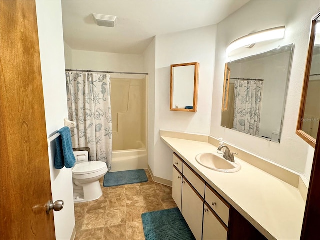 full bathroom with vanity, toilet, and shower / tub combo with curtain