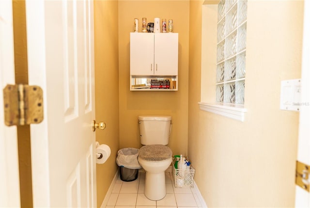 bathroom featuring tile patterned floors and toilet