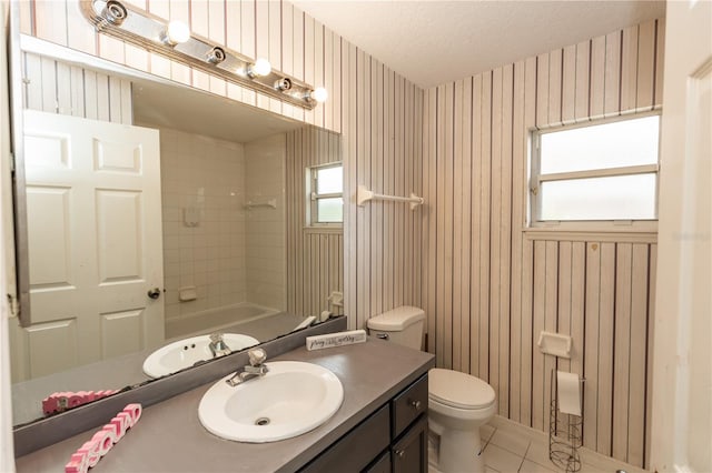107 Needlewood Loop, Debary, FL 32713 - full bath with toilet, vanity, tile patterned floors, shower / bath combination, and wallpapered walls