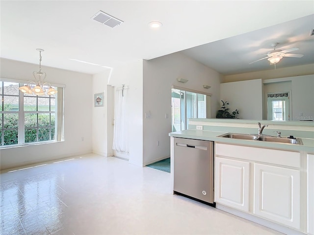 kitchen featuring ceiling fan with notable chandelier, decorative light fixtures, sink, dishwasher, and white cabinets