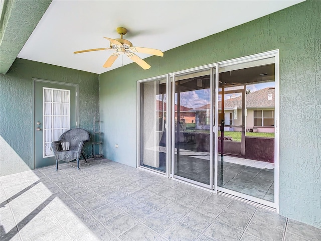 view of patio with ceiling fan