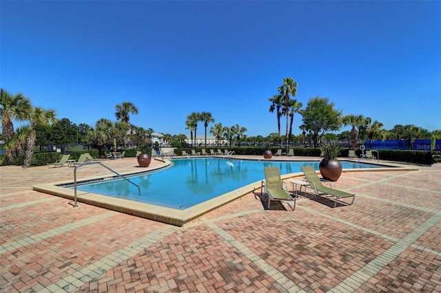 view of swimming pool featuring a patio area