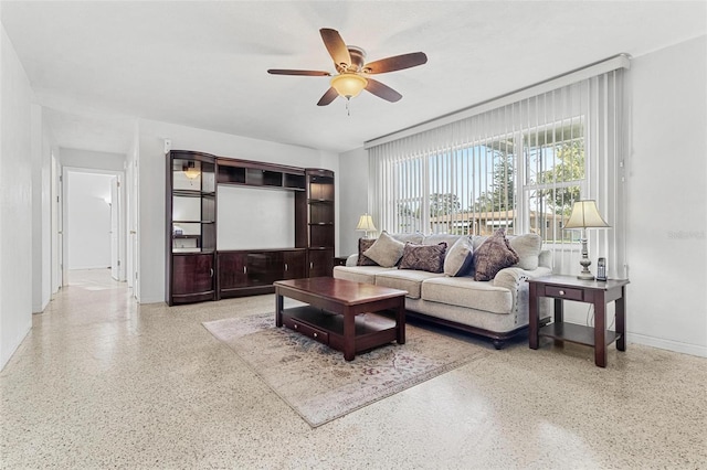 living room with ceiling fan