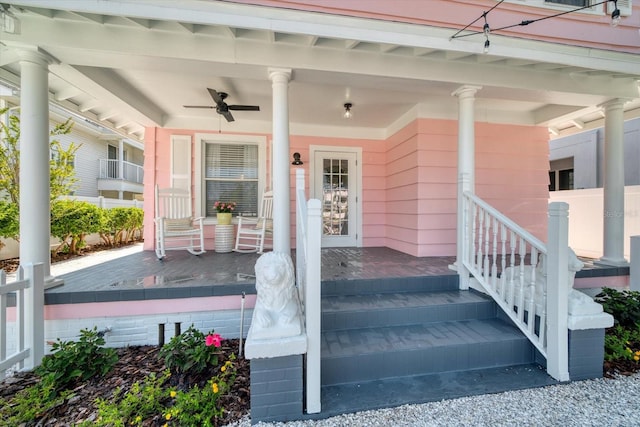 property entrance featuring ceiling fan and covered porch