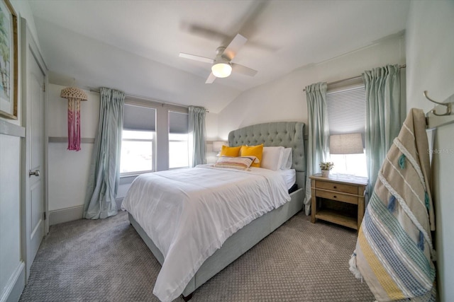 bedroom with carpet floors, vaulted ceiling, and ceiling fan