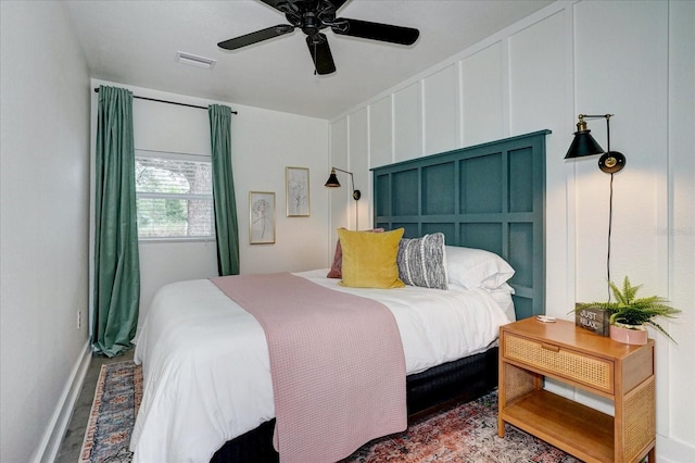 bedroom featuring ceiling fan and hardwood / wood-style floors