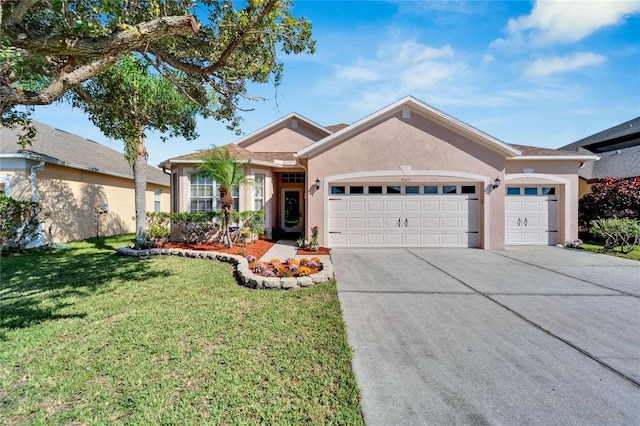 single story home with a front yard and a garage