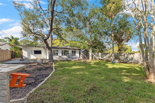 view of yard featuring a deck