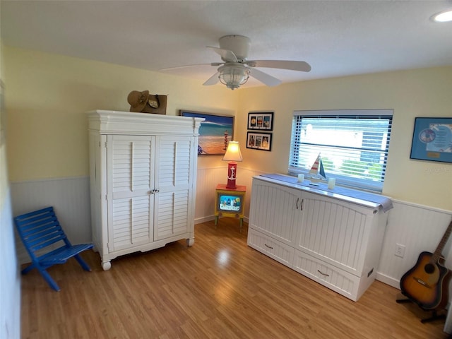 bedroom featuring ceiling fan and light hardwood / wood-style floors