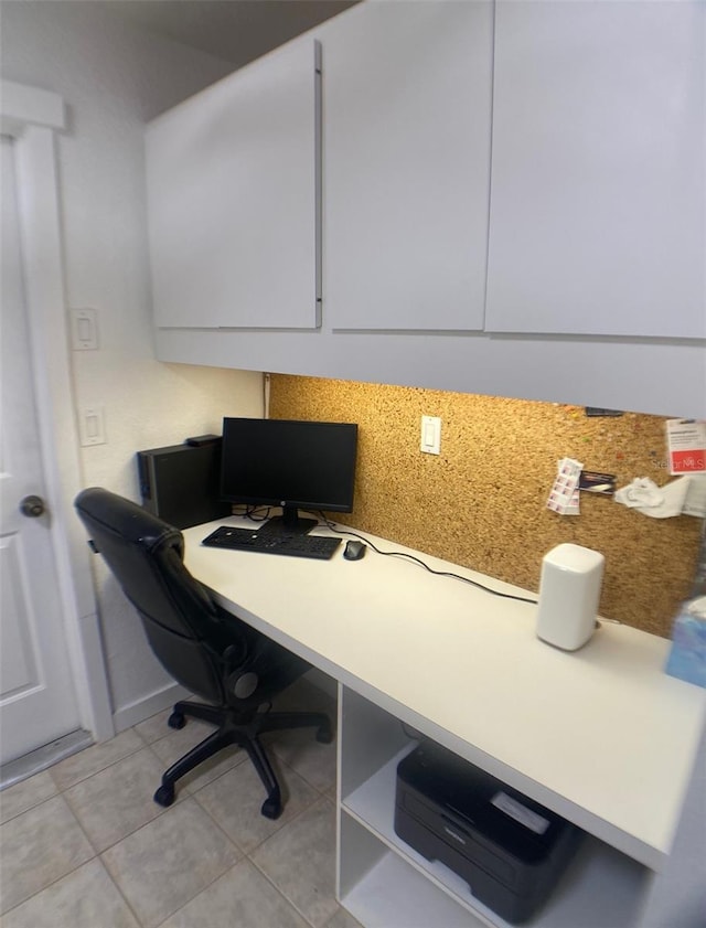 home office with light tile patterned floors