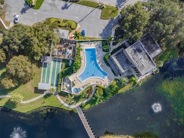 birds eye view of property featuring a water view