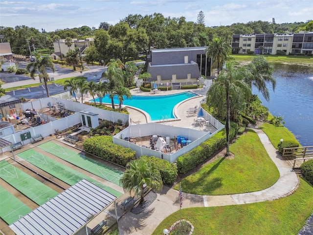 birds eye view of property with a water view