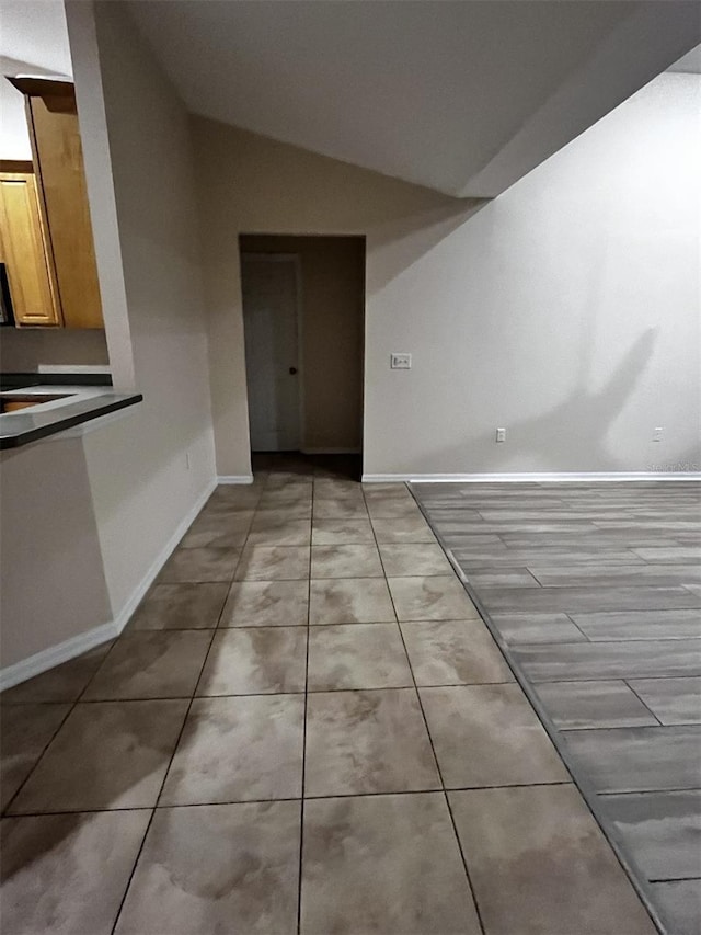 interior space featuring lofted ceiling