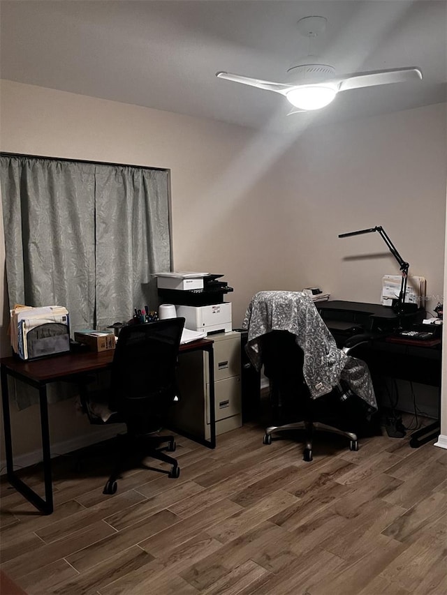 office with hardwood / wood-style flooring