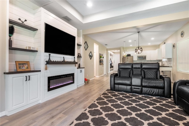 living room with light wood-type flooring