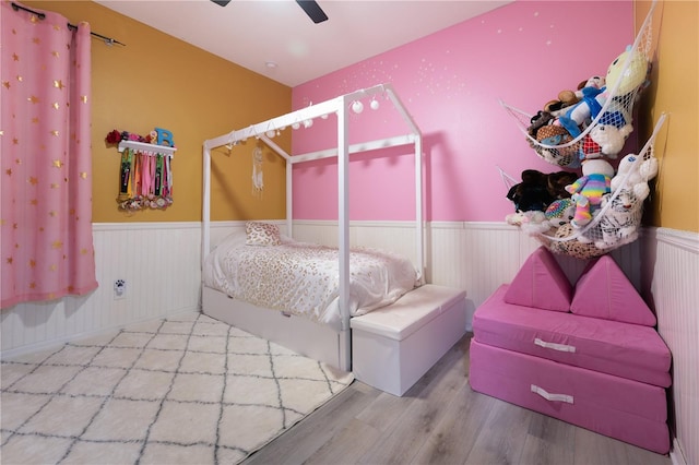 bedroom featuring ceiling fan and hardwood / wood-style floors