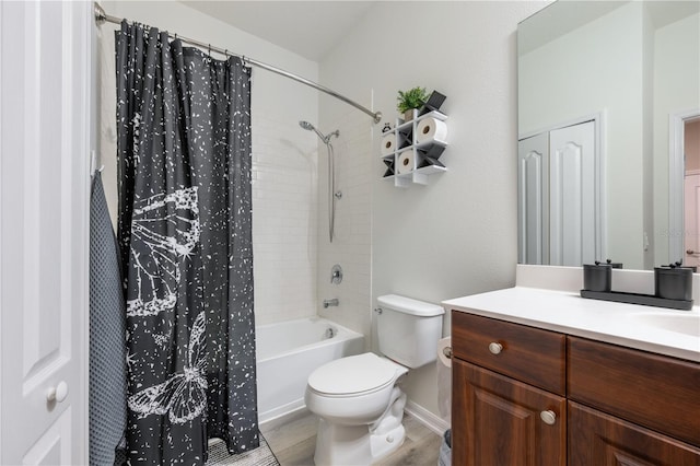 full bathroom featuring shower / bathtub combination with curtain, hardwood / wood-style floors, vanity, and toilet