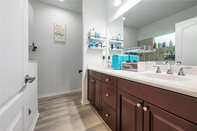 bathroom with wood-type flooring and vanity