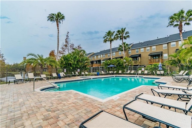 view of swimming pool featuring a patio