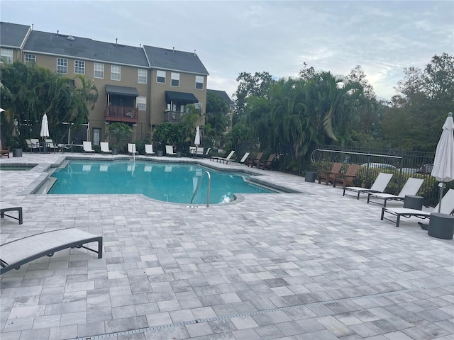 view of pool featuring a patio area