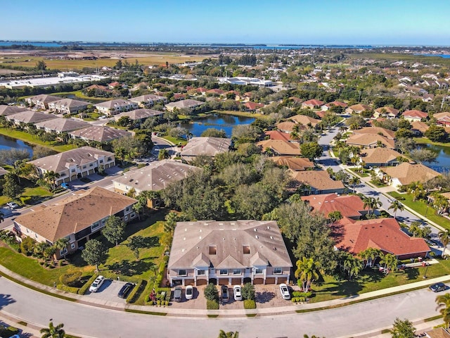 drone / aerial view with a water view