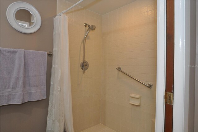 bathroom with a shower with shower curtain