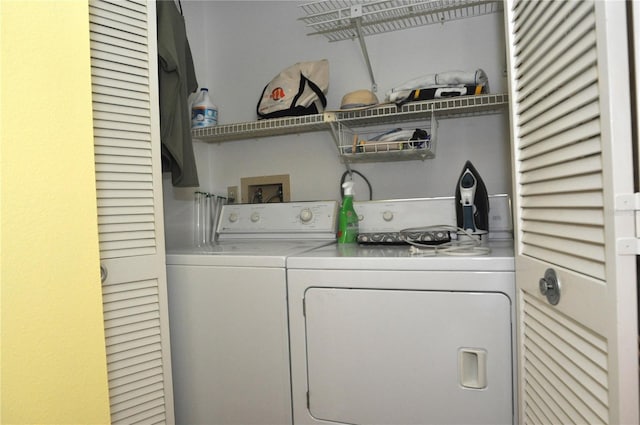 laundry area featuring washer and clothes dryer