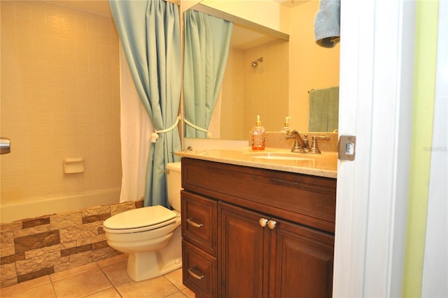 full bathroom featuring shower / bath combo, tile patterned flooring, vanity, and toilet