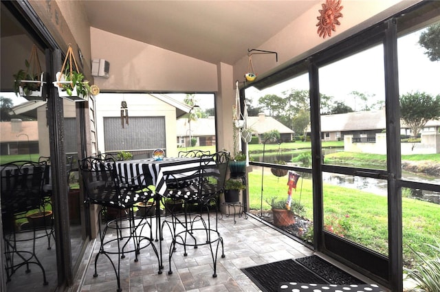 sunroom / solarium with vaulted ceiling and plenty of natural light