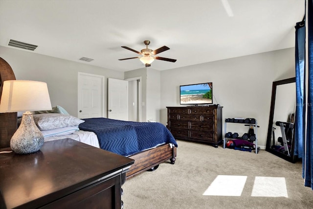 bedroom featuring ceiling fan and light colored carpet