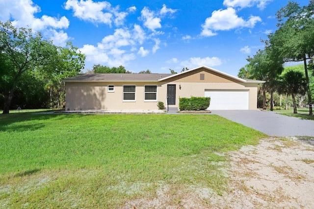 ranch-style home with a garage and a front lawn