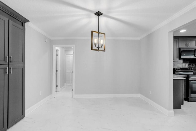 dining area featuring crown molding and an inviting chandelier