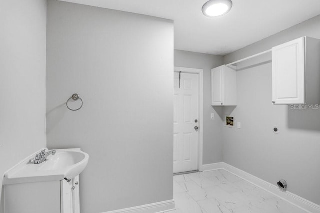 laundry room featuring hookup for an electric dryer, cabinets, hookup for a washing machine, and sink