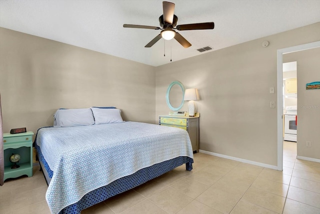 tiled bedroom with ceiling fan