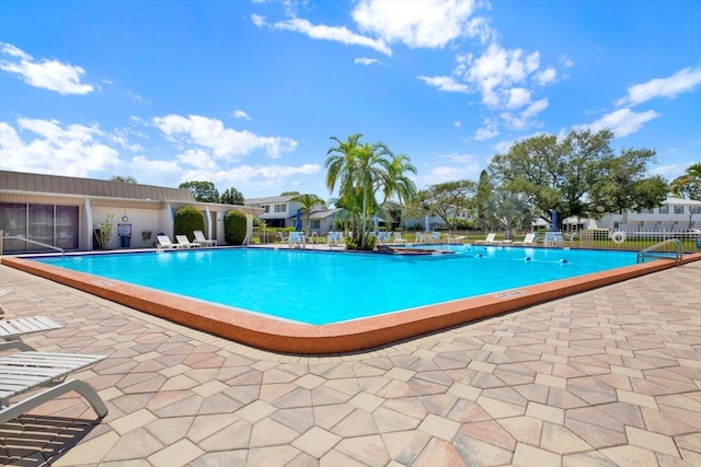 view of pool featuring a patio