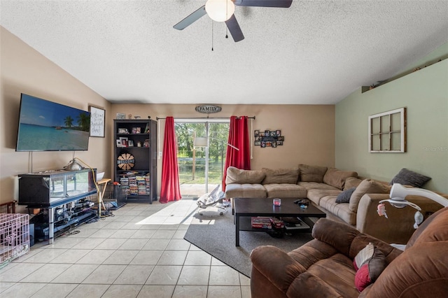 tiled living room featuring a textured ceiling and ceiling fan