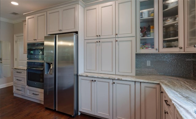 kitchen featuring backsplash, stainless steel fridge with ice dispenser, white cabinetry, light stone countertops, and dark hardwood / wood-style flooring